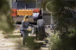 Melissa Edge Making Lunch on Rigd Supply UltraSwing Hitch Carrier Table at Overlanding Camp in...jpg